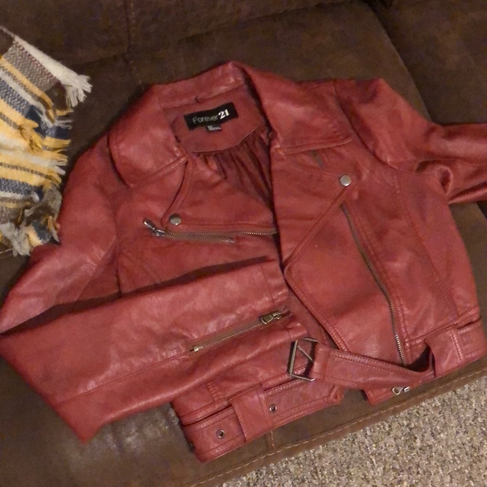 Super cute red leather jacket.